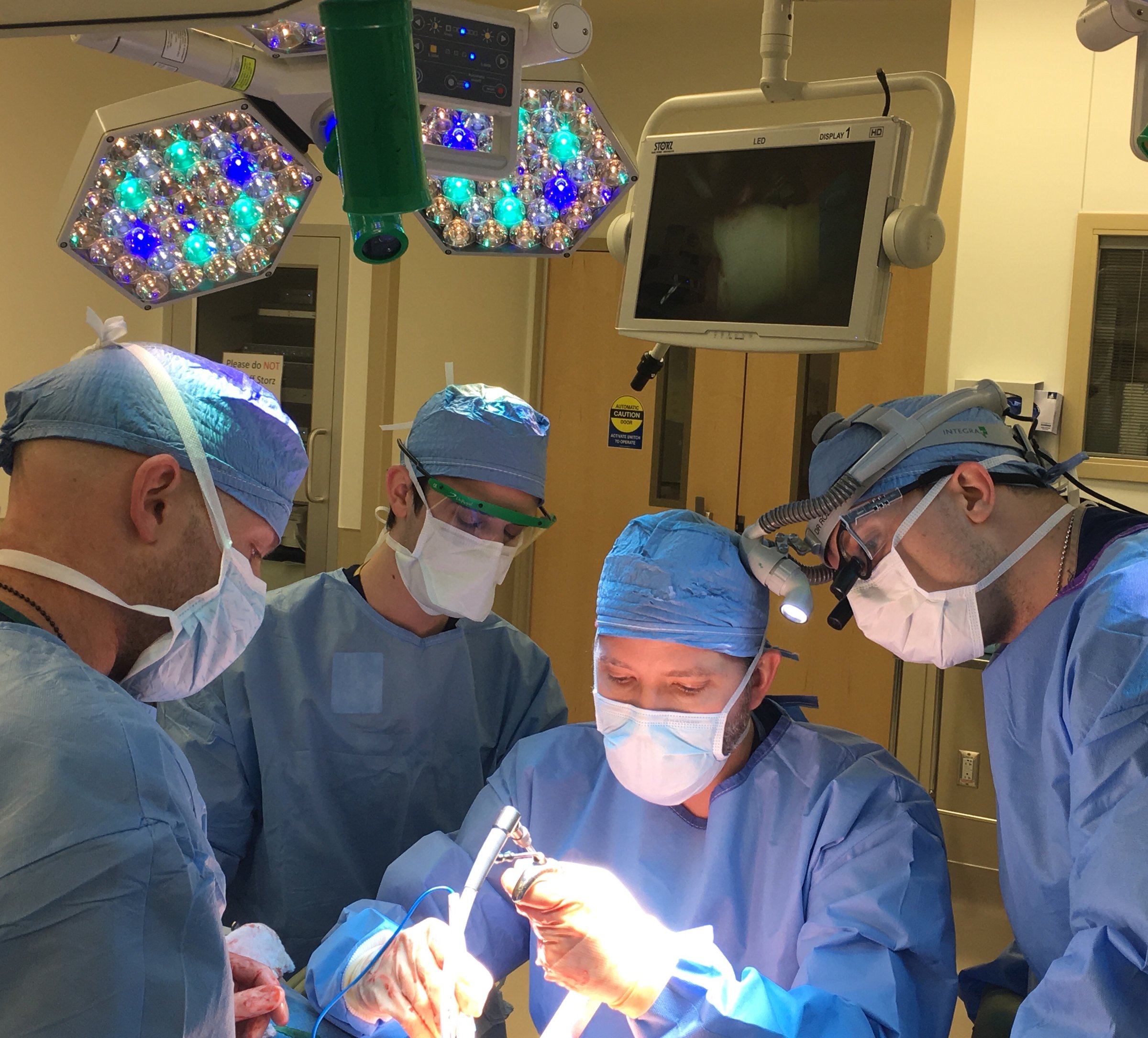 Dr. Haddock and the surgical team operating