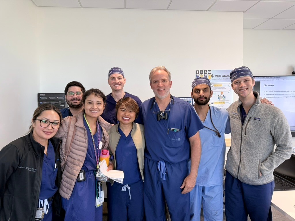 Dr. Haddock with visiting surgeons at UT Southwestern